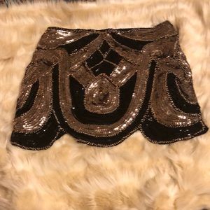 Gold and black sequined skirt